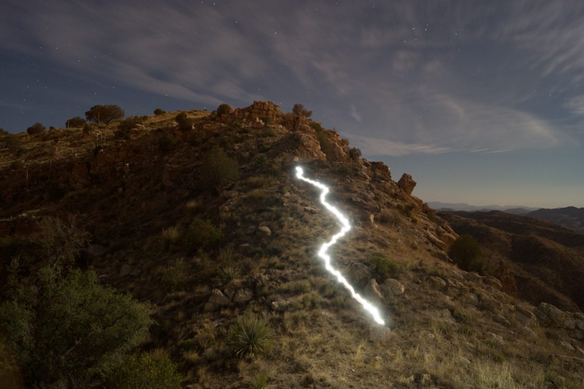 2013 May Axhel hiking down the final hillside before Point 4981