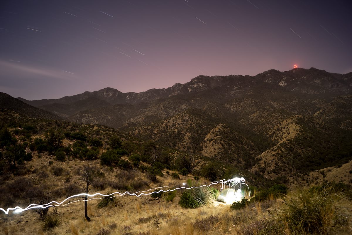 2014 March Camping above Edgar Canyon with the Lights of Mount Bigelow in the Background