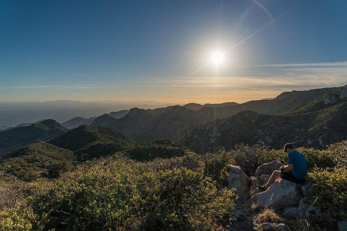 2016 March Gavin on the summit of USGS Guthrie Mountain