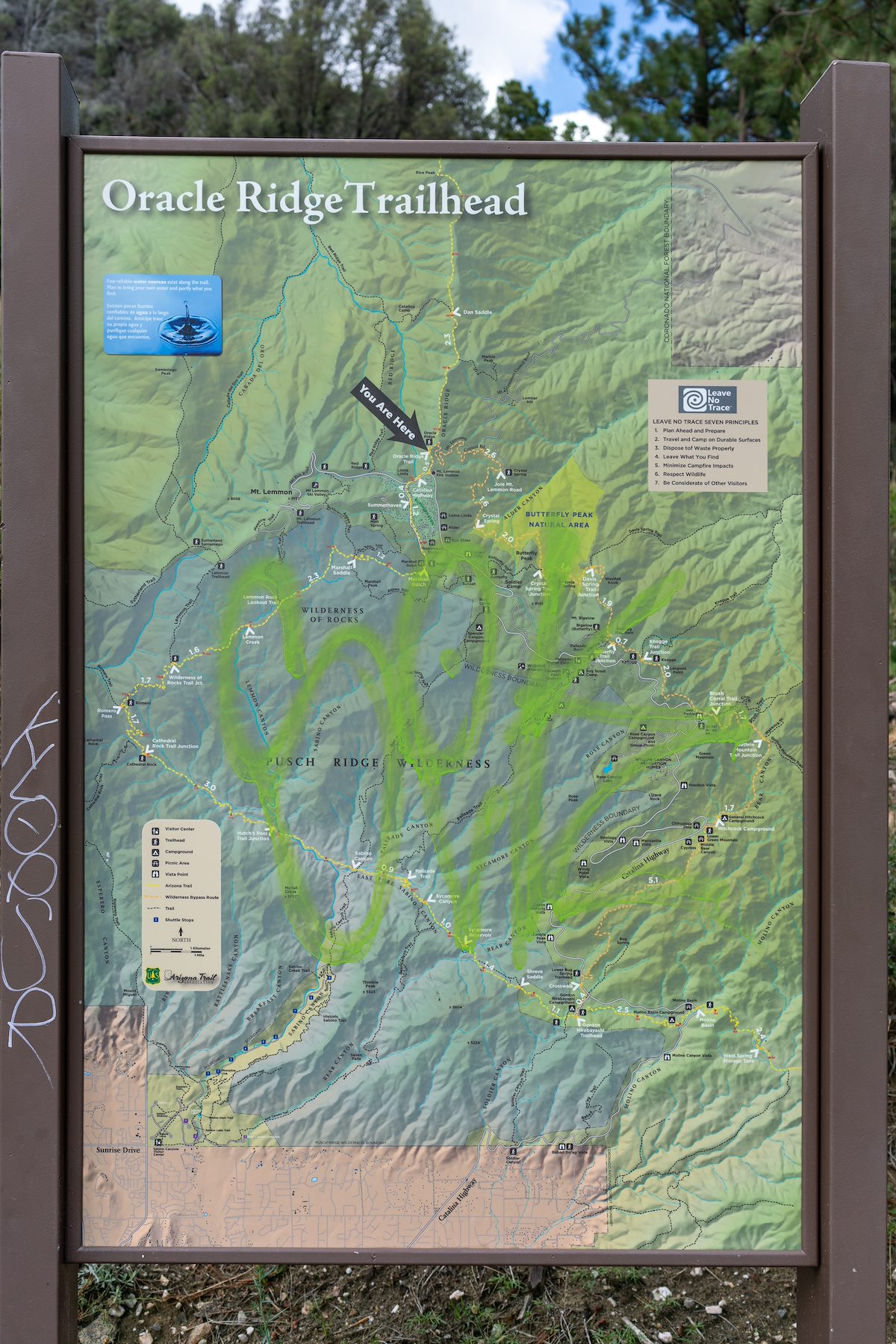2018 July Graffiti on the Oracle Ridge Trailhead sign
